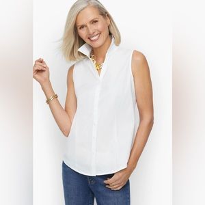 Sleeveless white button down blouse